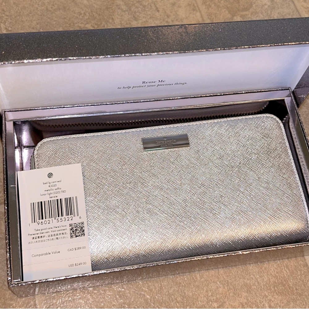 NWT Kate Spade Metallic saffia Kenzie wallet, in Lunar Light.